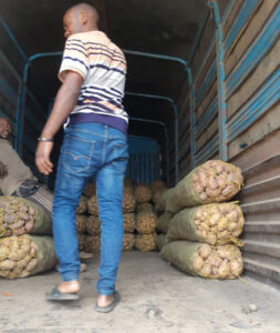 Selling potatoes right from the truck in Mabibo, a suburb of Dar es Salaam
